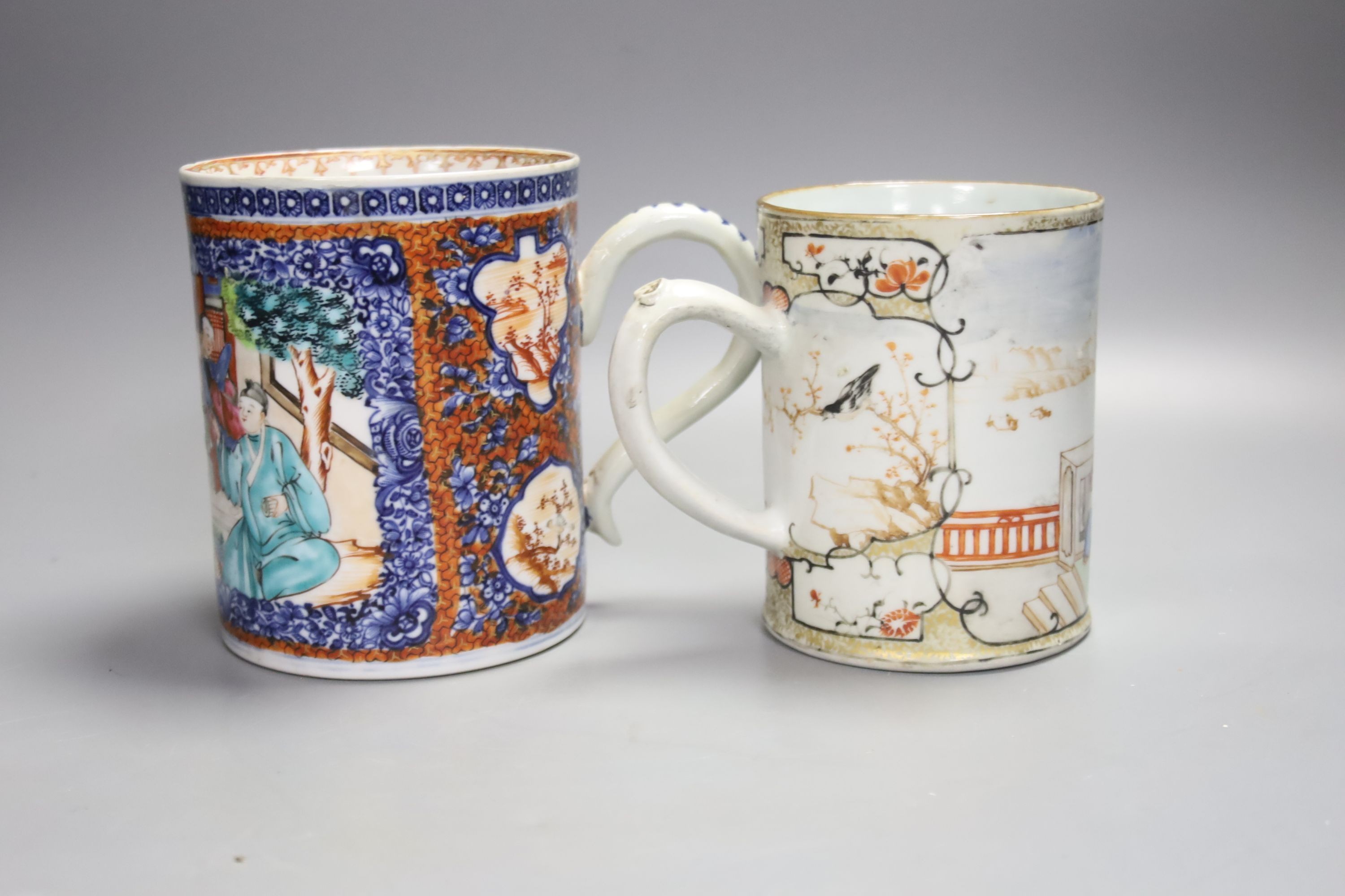 Two large 18th century Chinese famille rose export mugs, height 13.5cm